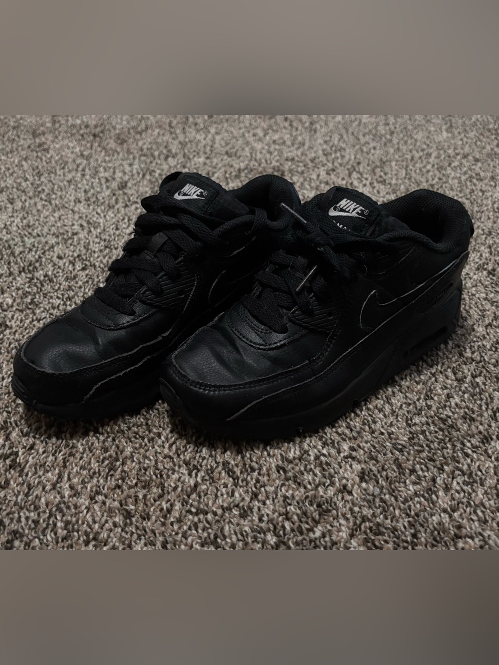 Nike Kids Black Low-Top Sneaker with Subtle Swoosh